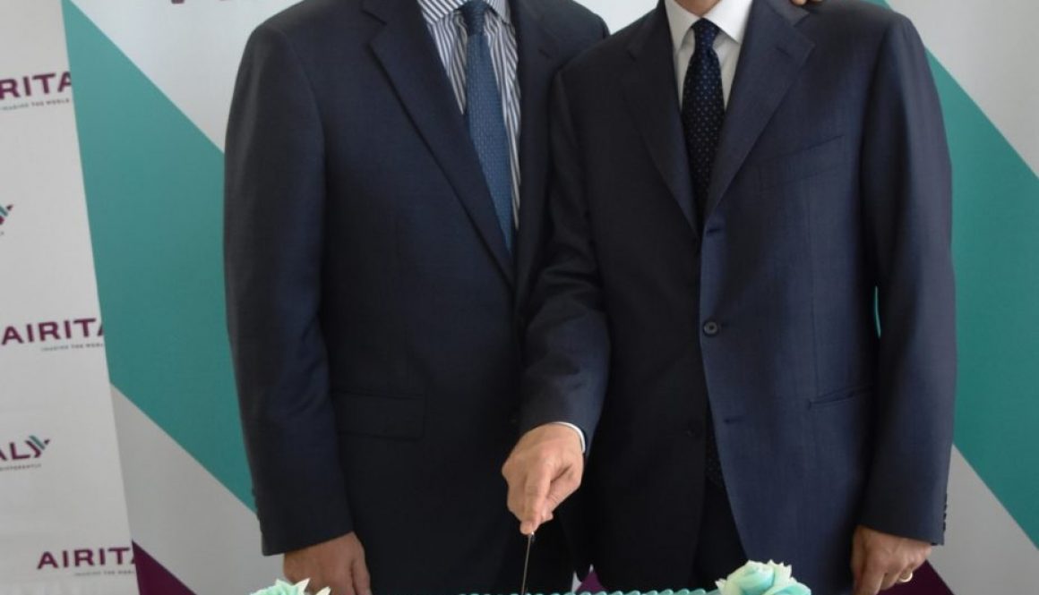 John Selden (left), of the NY and NJ Port Authority, and Marco Rigotti (right), Deputy Executive Chairman of Air Italy, cut a cake to celebrate Air Italy's first flight from JFK Int'l Airport. Photo courtesy of: Air Italy Media Center.